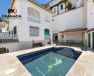 Exterior view of House or chalet for sale in  Granada Capital  with Terrace and Swimming Pool