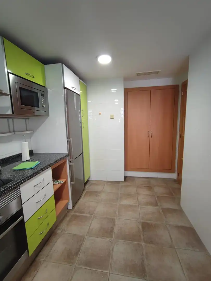 Kitchen of Flat for sale in Sueca  with Air Conditioner and Storage room