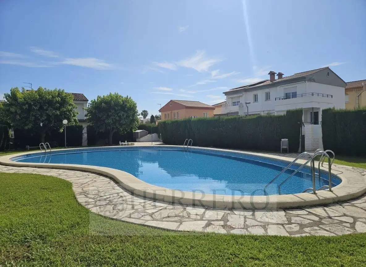 Piscina de Casa adosada en venta en Gandia con Aire acondicionado, Calefacción y Jardín privado