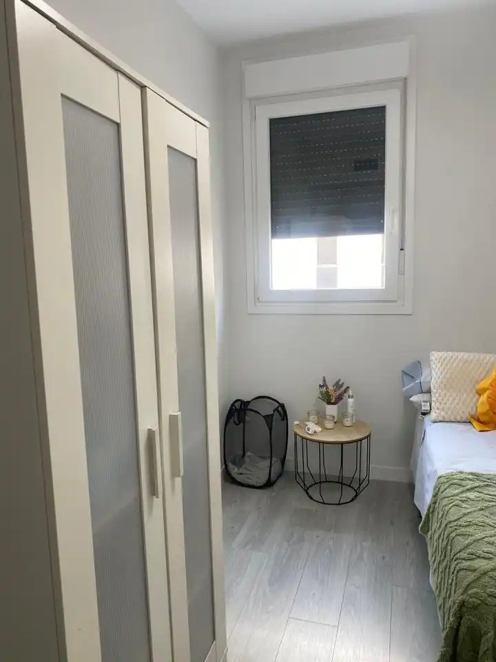 Bedroom of Flat for share in Dos Hermanas