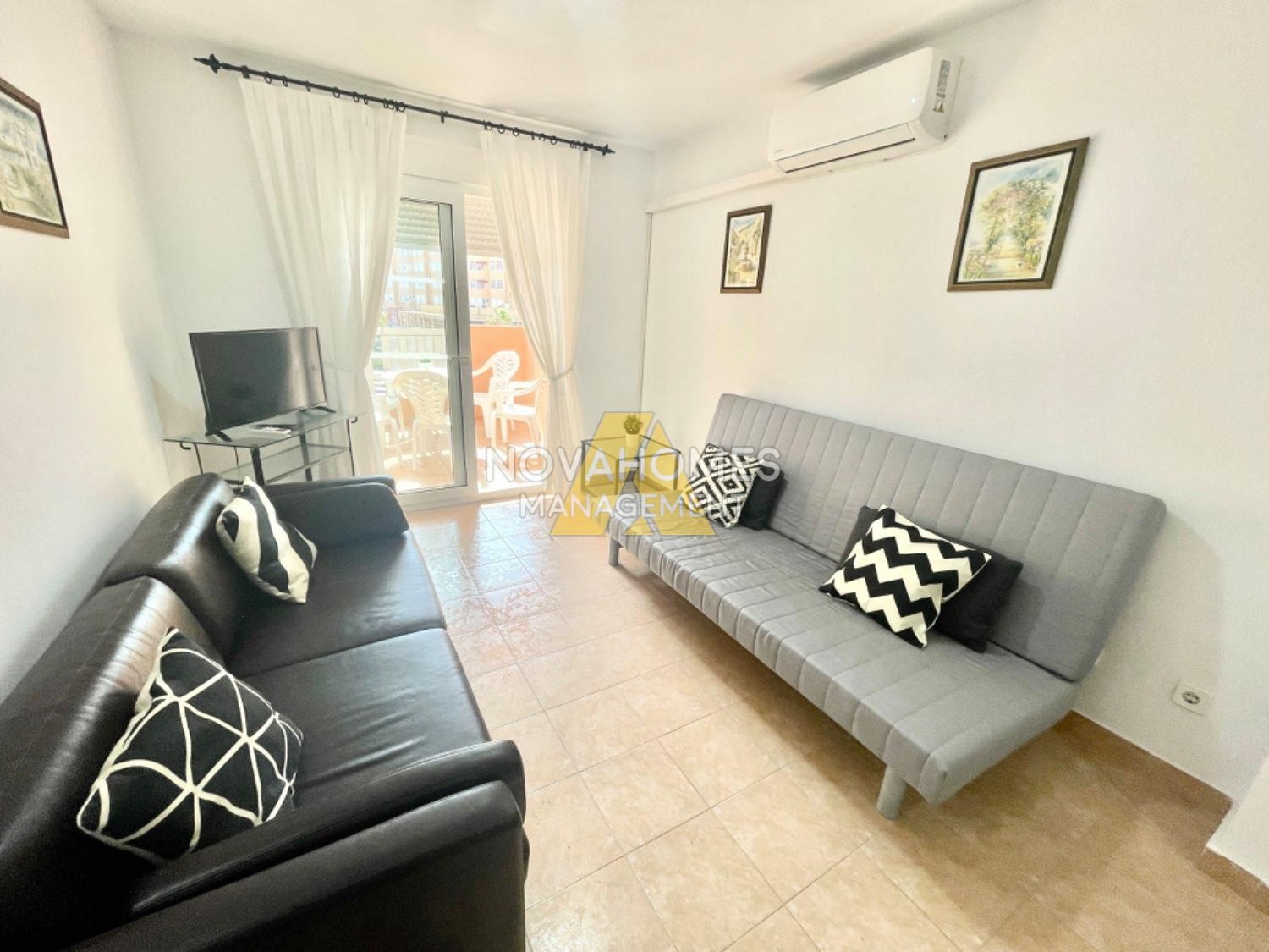 Sala d'estar de Apartament en venda en La Manga del Mar Menor amb Aire condicionat, Calefacció i Terrassa