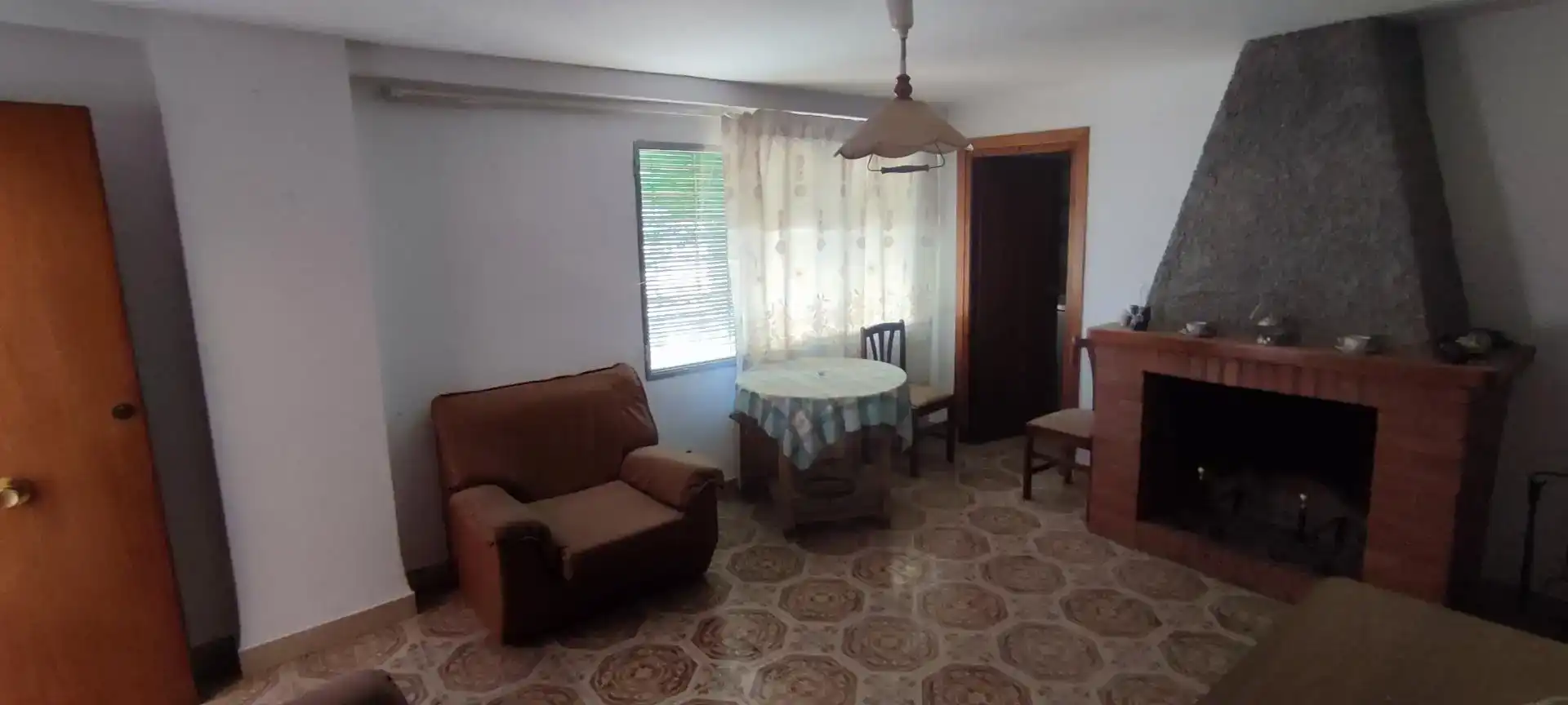 Sala d'estar de Casa adosada en venda en Güéjar Sierra