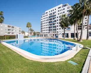 Piscina de Apartament de lloguer en La Pobla de Farnals amb Aire condicionat, Calefacció i Jardí privat