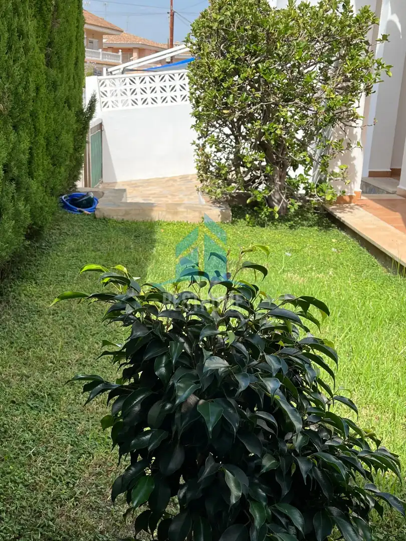Jardí de Casa adosada en venda en Sueca amb Jardí privat, Terrassa i Traster