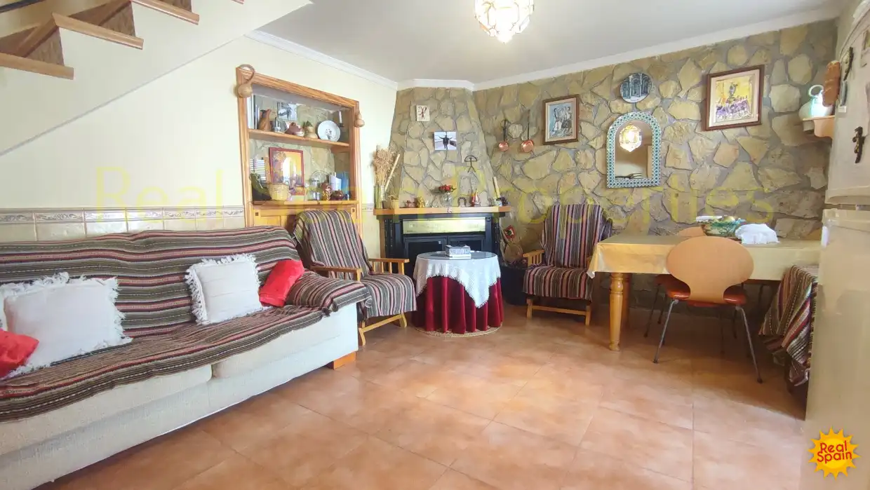 Sala de estar de Casa adosada en venta en María con Terraza, Balcón y Internet