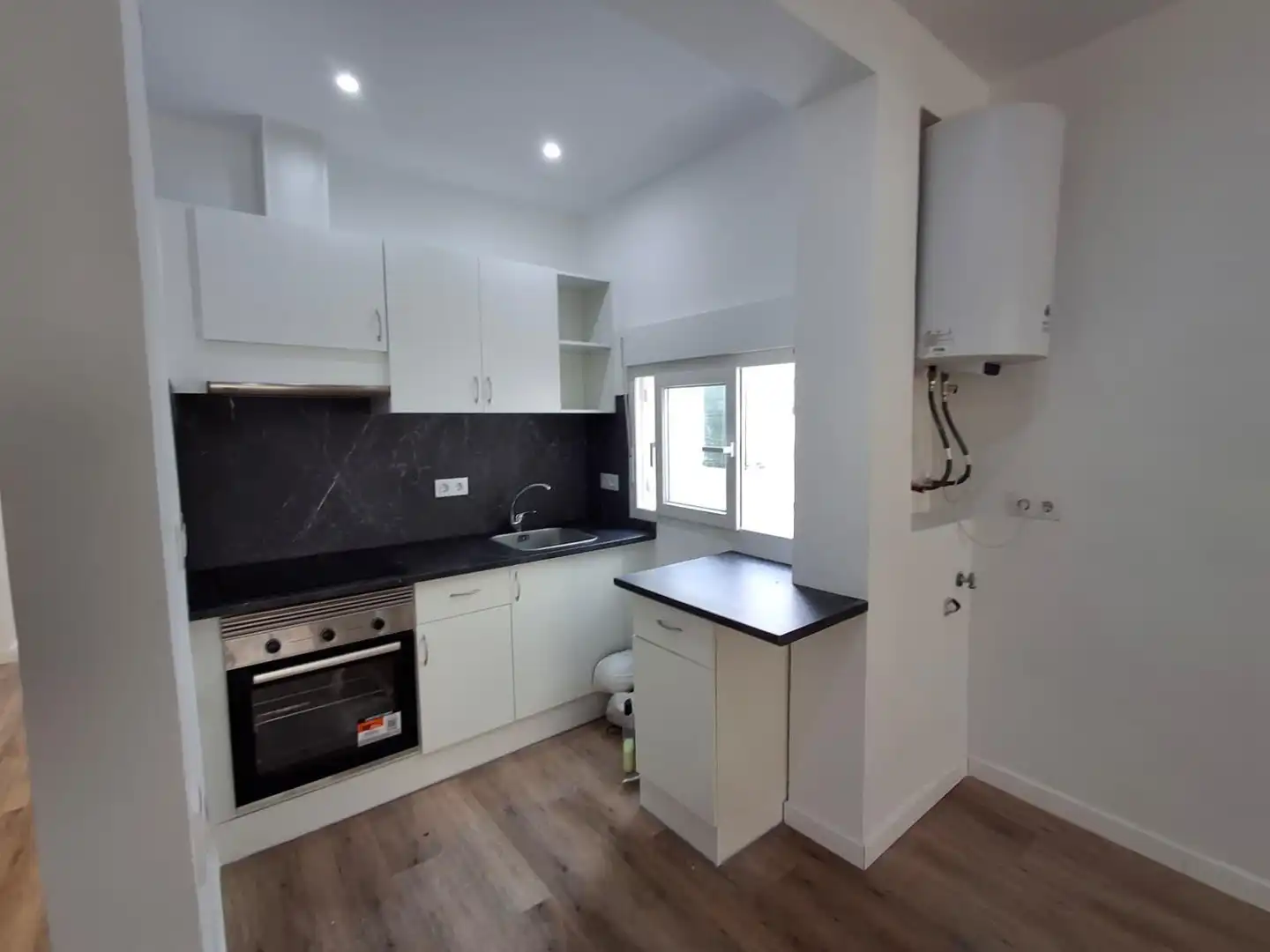 Kitchen of Flat for sale in L'Alcúdia  with Air Conditioner, Heating and Storage room