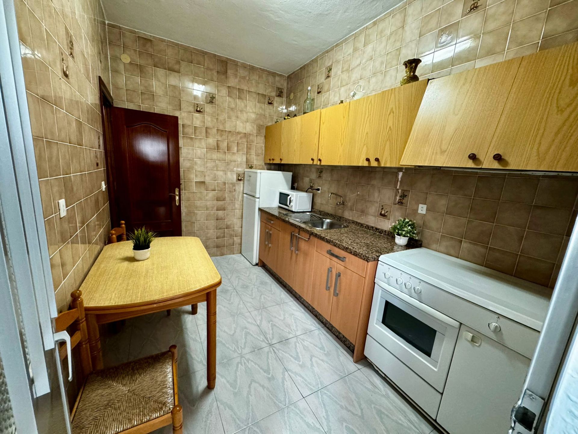 Kitchen of House or chalet for sale in Málaga Capital  with Air Conditioner, Terrace and Furnished