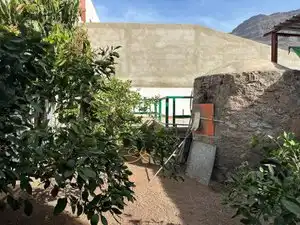 Vista exterior de Casa adosada en venda en Mogán amb Jardí privat, Piscina i Moblat
