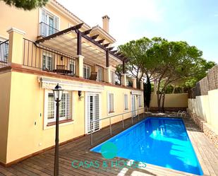 Exterior view of House or chalet for sale in La Manga del Mar Menor  with Heating, Private garden and Swimming Pool