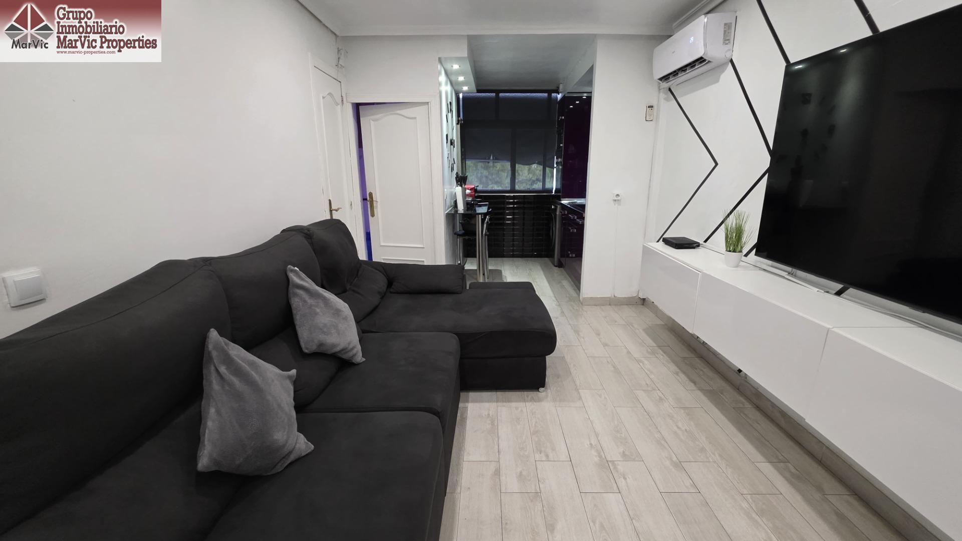 Sala de estar de Piso en venta en Benidorm con Aire acondicionado, Piscina y Piscina comunitaria