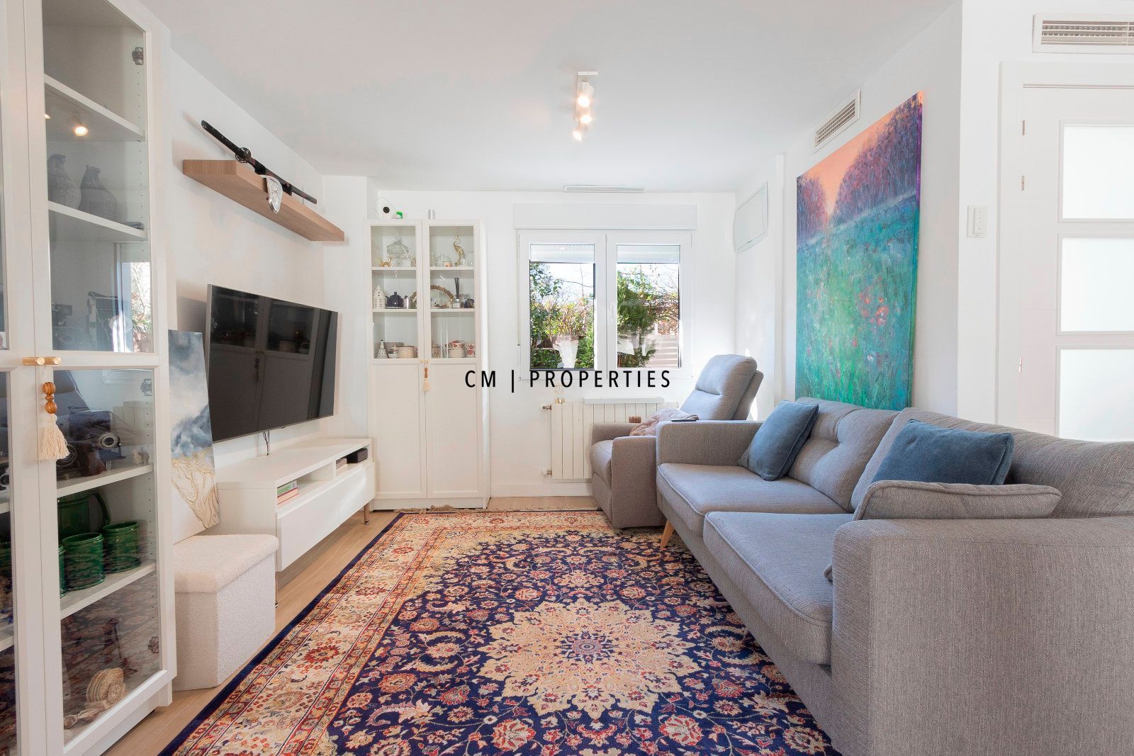 Sala d'estar de Casa adosada en venda en Picanya amb Aire condicionat, Terrassa i Traster