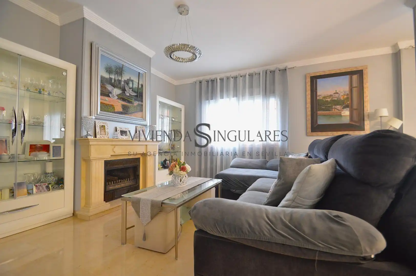 Sala de estar de Casa adosada en venta en Sevilla con Aire acondicionado, Terraza y Trastero