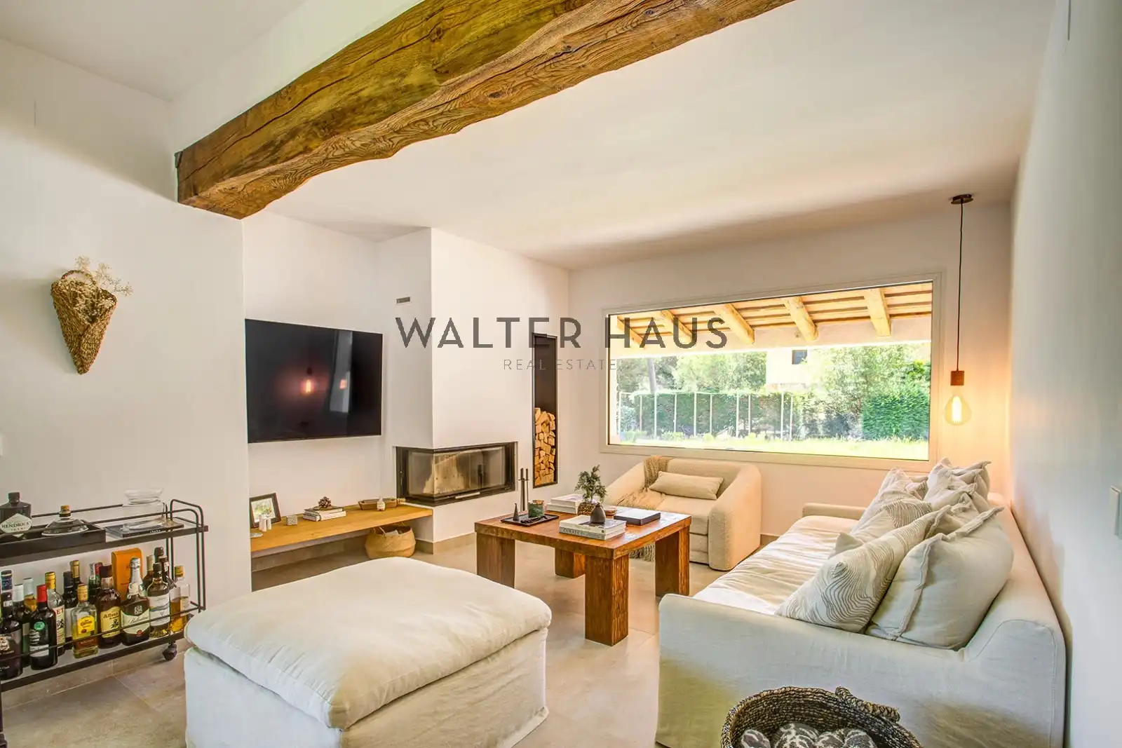 Sala d'estar de Casa adosada en venda en Santa Cristina d'Aro amb Aire condicionat, Jardí privat i Terrassa