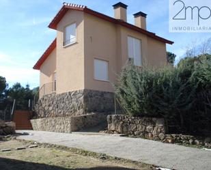 Exterior view of House or chalet for sale in Manzanares El Real  with Terrace and Balcony