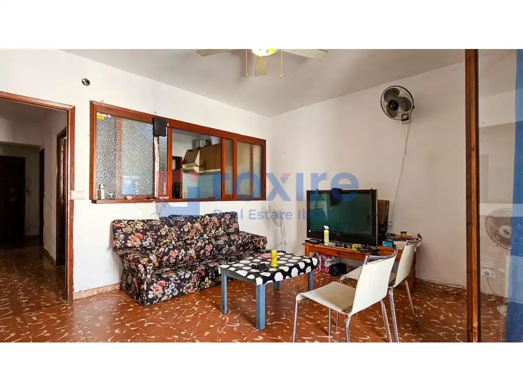 Sala de estar de Piso en venta en Sant Antoni de Portmany con Lavadora y Balcón