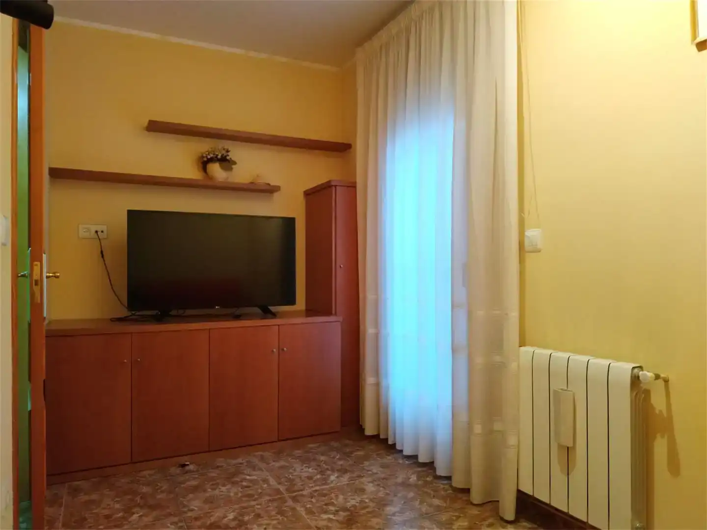 Sala de estar de Casa adosada en venta en Calanda con Amueblado y Balcón