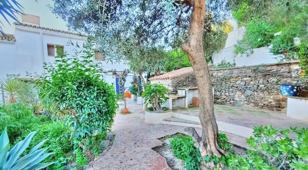 Casa rústica amb jardí en venda a Macharaviaya