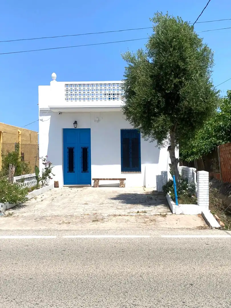 Vista exterior de Casa o xalet en venda en Sueca amb Aire condicionat, Jardí privat i Terrassa