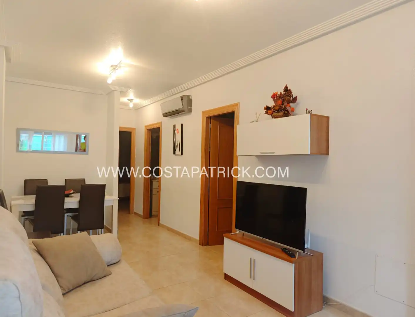 Sala d'estar de Casa adosada en venda en Los Alcázares amb Aire condicionat, Calefacció i Moblat