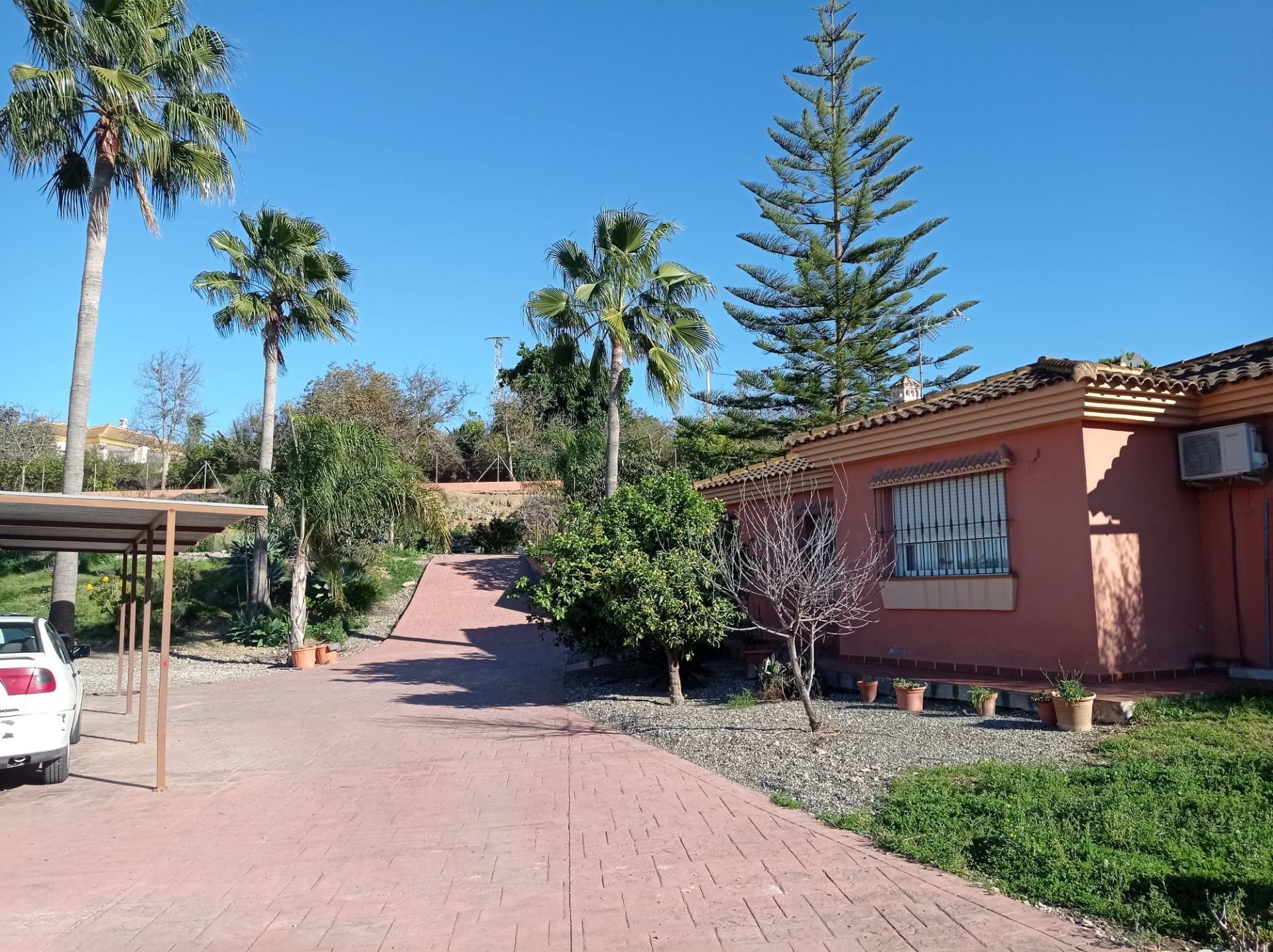 Exterior view of House or chalet for sale in Alhaurín de la Torre  with Air Conditioner and Storage room