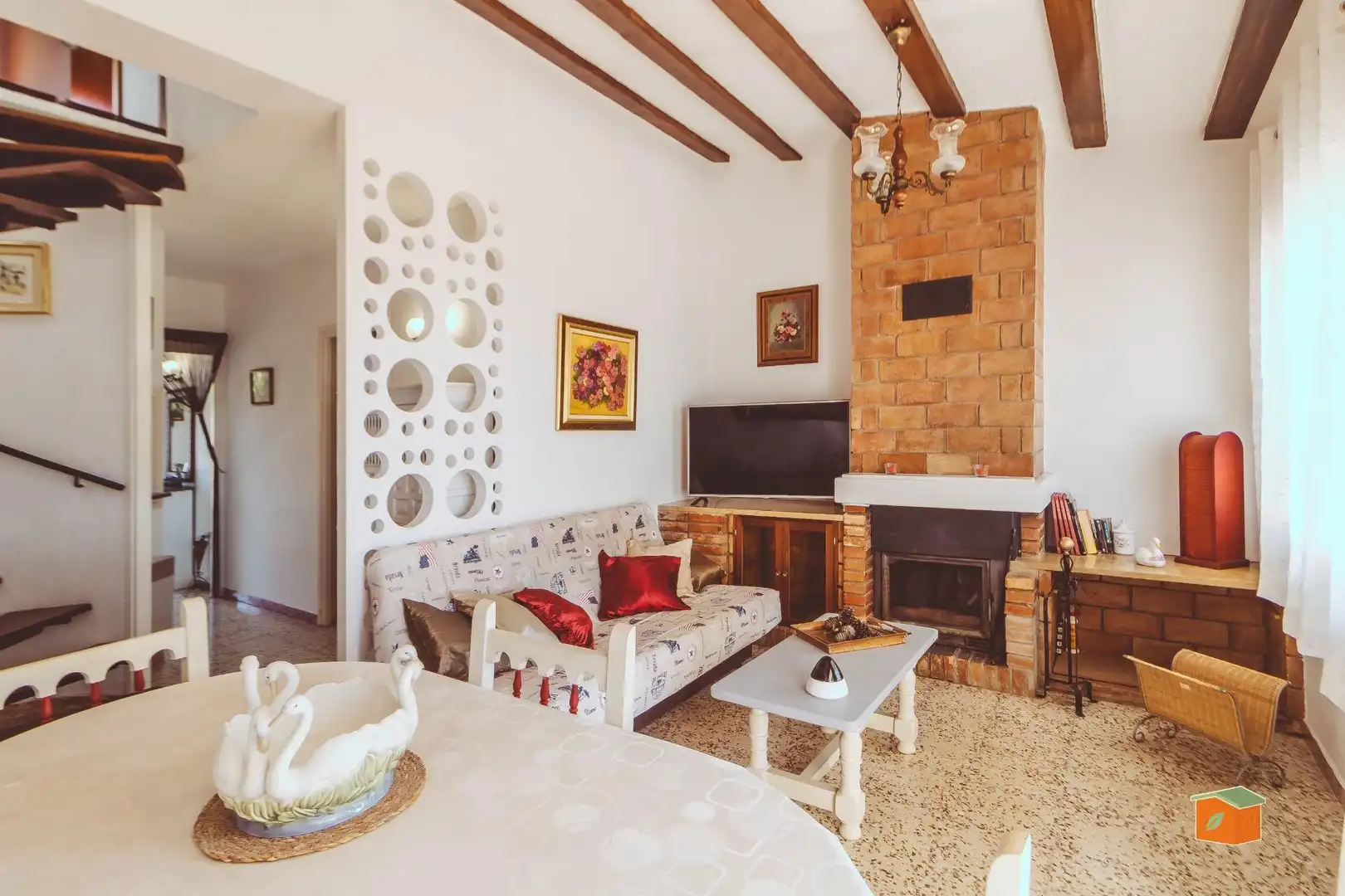 Sala d'estar de Casa adosada en venda en Alcanar amb Jardí privat, Terrassa i Moblat