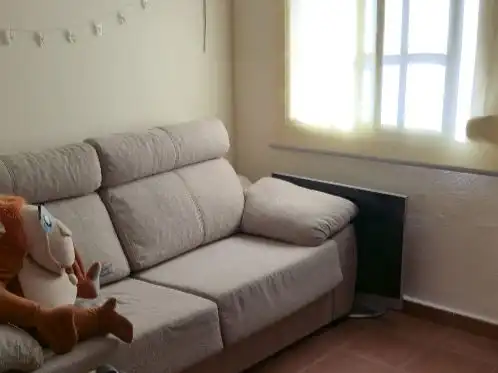 Sala d'estar de Casa o xalet en venda en Algeciras amb Aire condicionat, Terrassa i Balcó