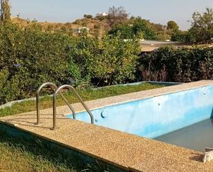 Swimming pool of Country house for sale in Málaga Capital  with Air Conditioner, Heating and Private garden