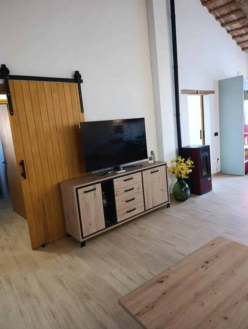Sala d'estar de Casa o xalet en venda en Deltebre amb Jardí privat i Terrassa