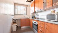 Kitchen of Flat for sale in Sabadell  with Air Conditioner and Balcony