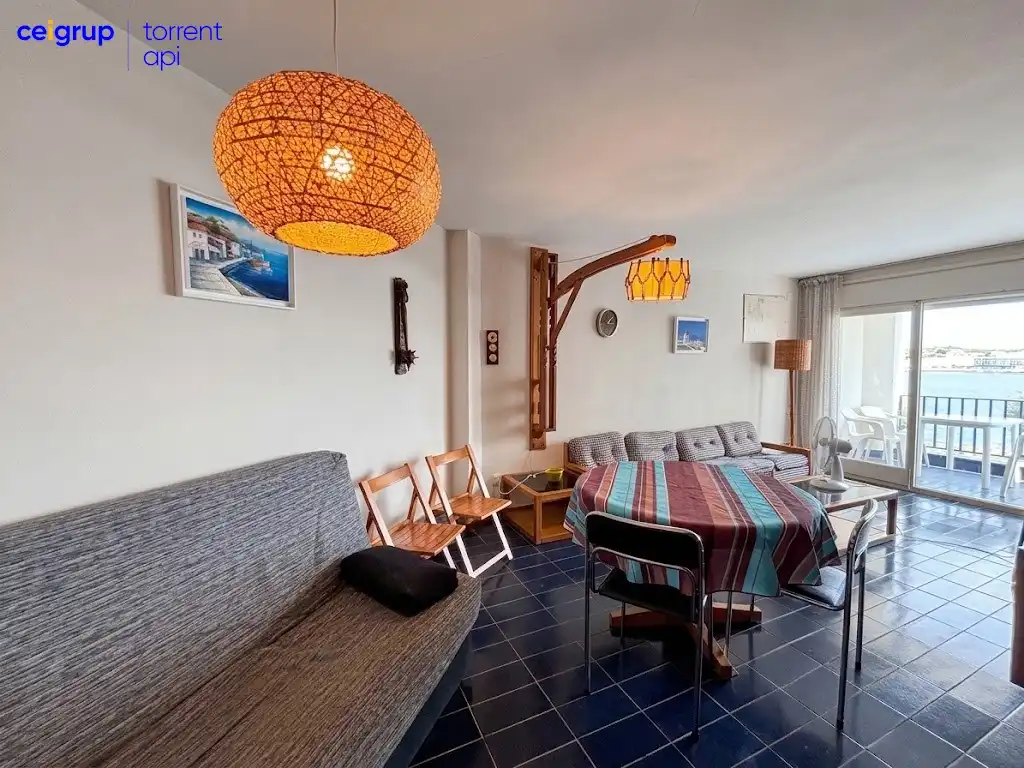 Living room of Flat for sale in L'Escala  with Terrace, Swimming Pool and Furnished
