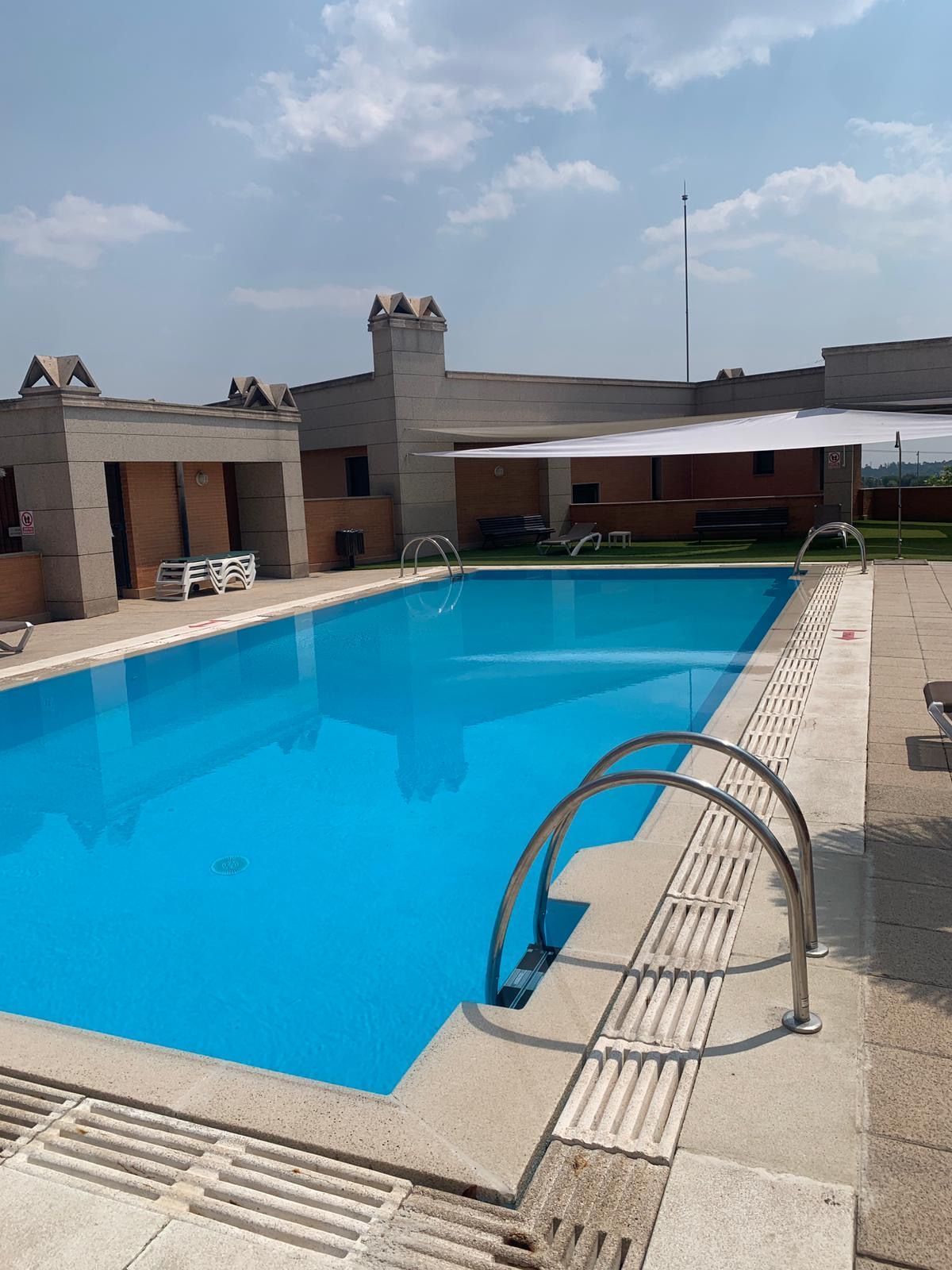 Swimming pool of Duplex for sale in Pozuelo de Alarcón  with Air Conditioner, Storage room and Community pool