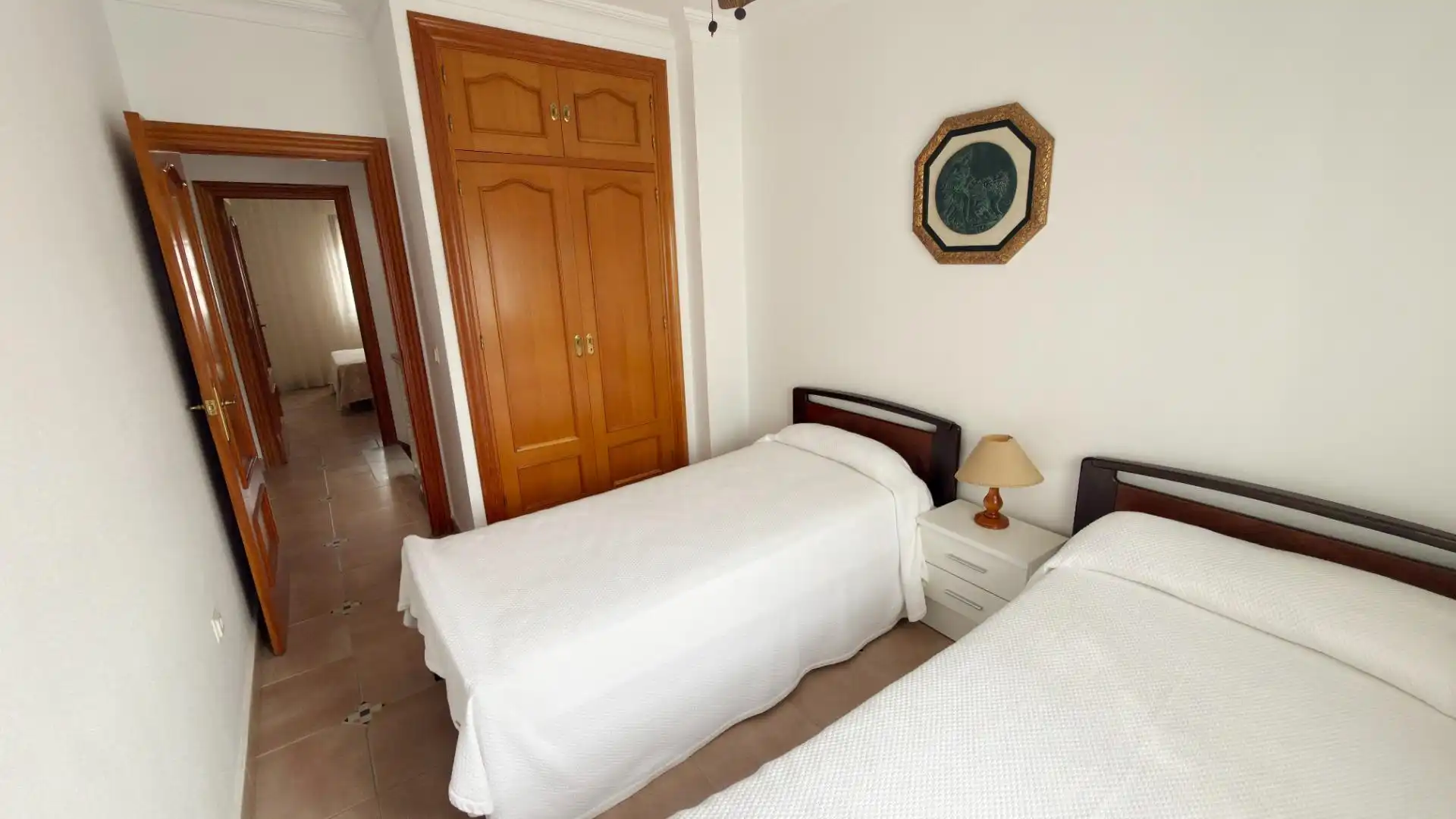 Habitación de Casa adosada de alquiler en Punta Umbría con Terraza y Piscina comunitaria