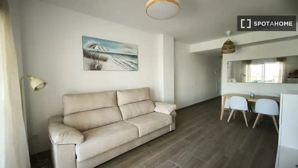 Sala de estar de Apartamento para compartir en Chipiona con Aire acondicionado, Terraza y Amueblado