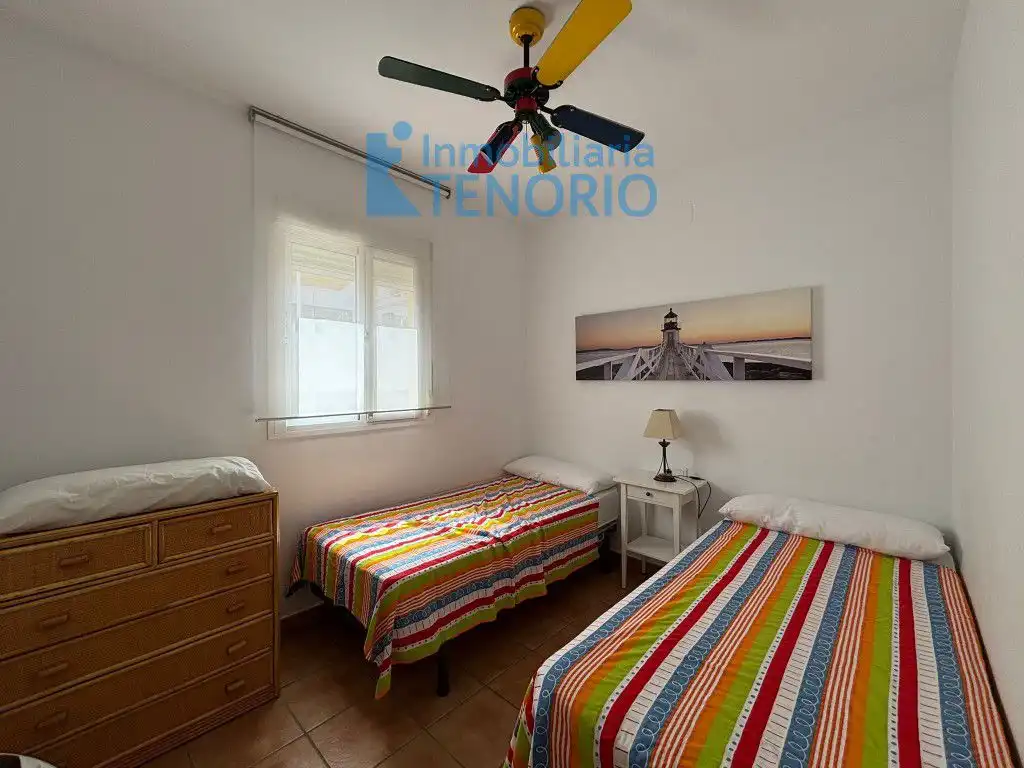 Habitación de Casa adosada en venta en Islantilla con Aire acondicionado, Terraza y Trastero