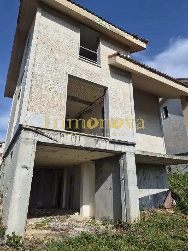Vista exterior de Casa o chalet en venta en A Merca   con Calefacción, Jardín privado y Terraza