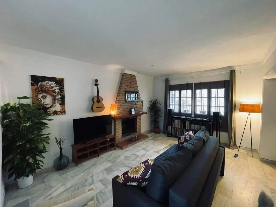 Sala de estar de Casa adosada en venta en Manilva con Aire acondicionado, Terraza y Horno