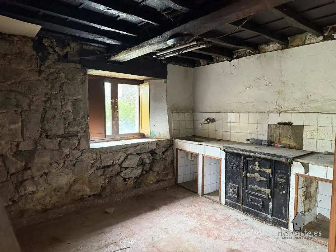 Cuina de Casa adosada en venda en Villaviciosa amb Jardí privat
