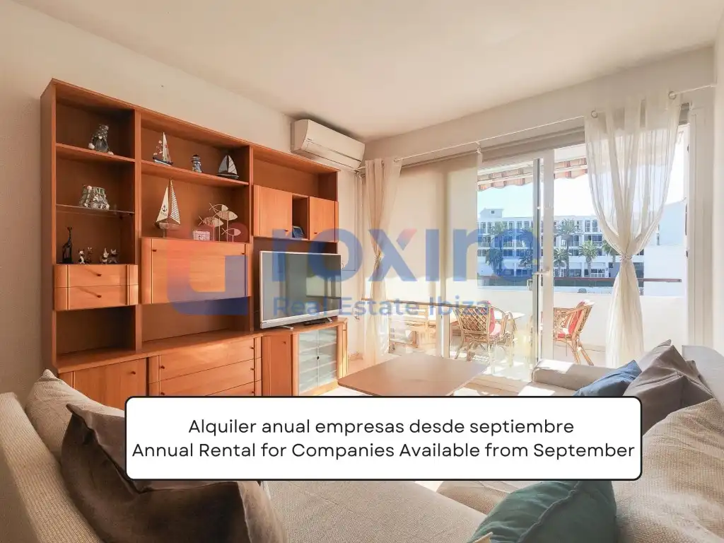 Sala d'estar de Apartament de lloguer en Sant Antoni de Portmany amb Aire condicionat, Terrassa i Moblat