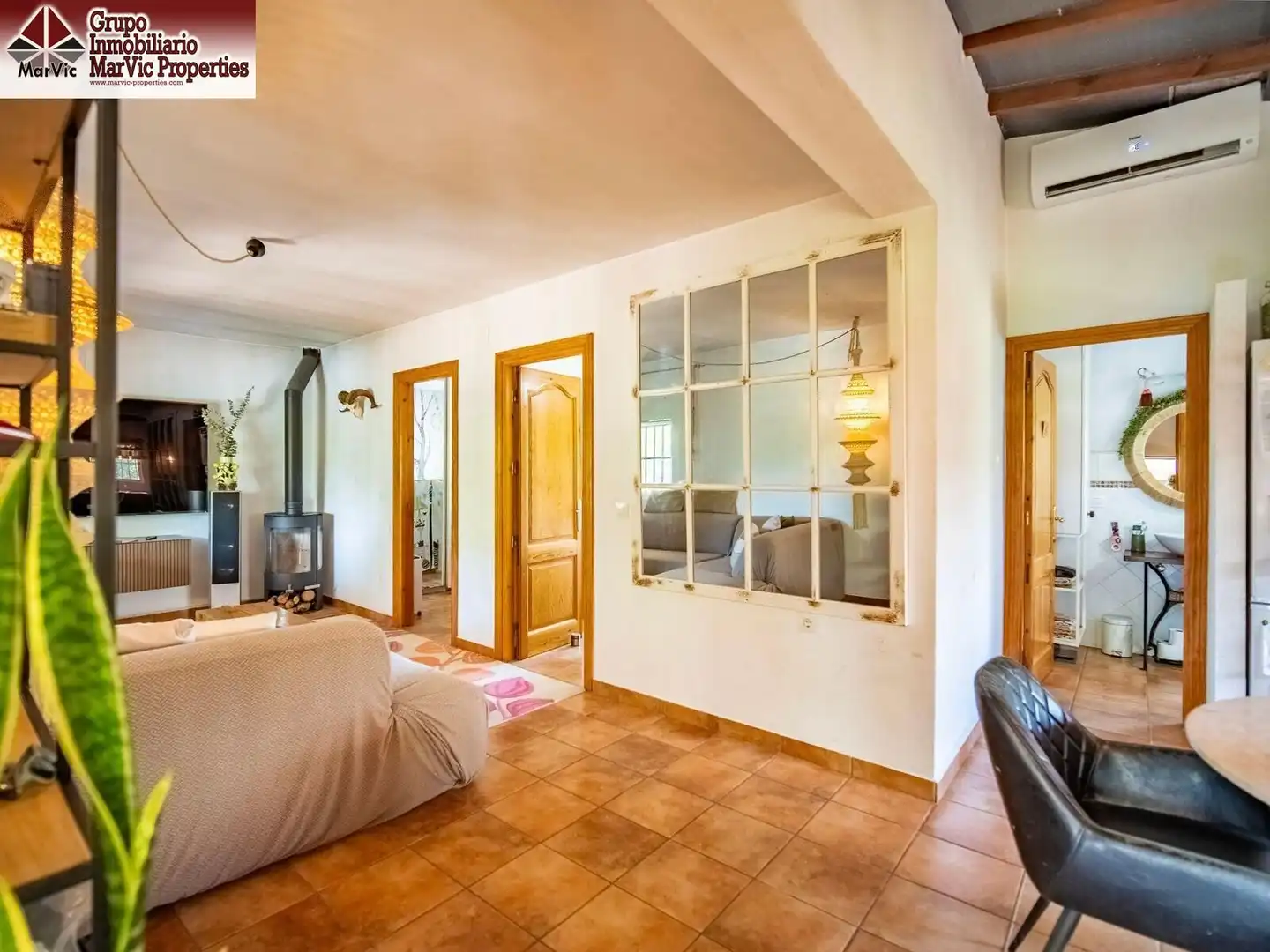 Sala d'estar de Apartament en venda en Callosa d'en Sarrià amb Aire condicionat, Jardí privat i Moblat