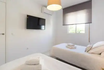 Habitación de Casa adosada en venta en Benalmádena con Aire acondicionado, Calefacción y Jardín privado