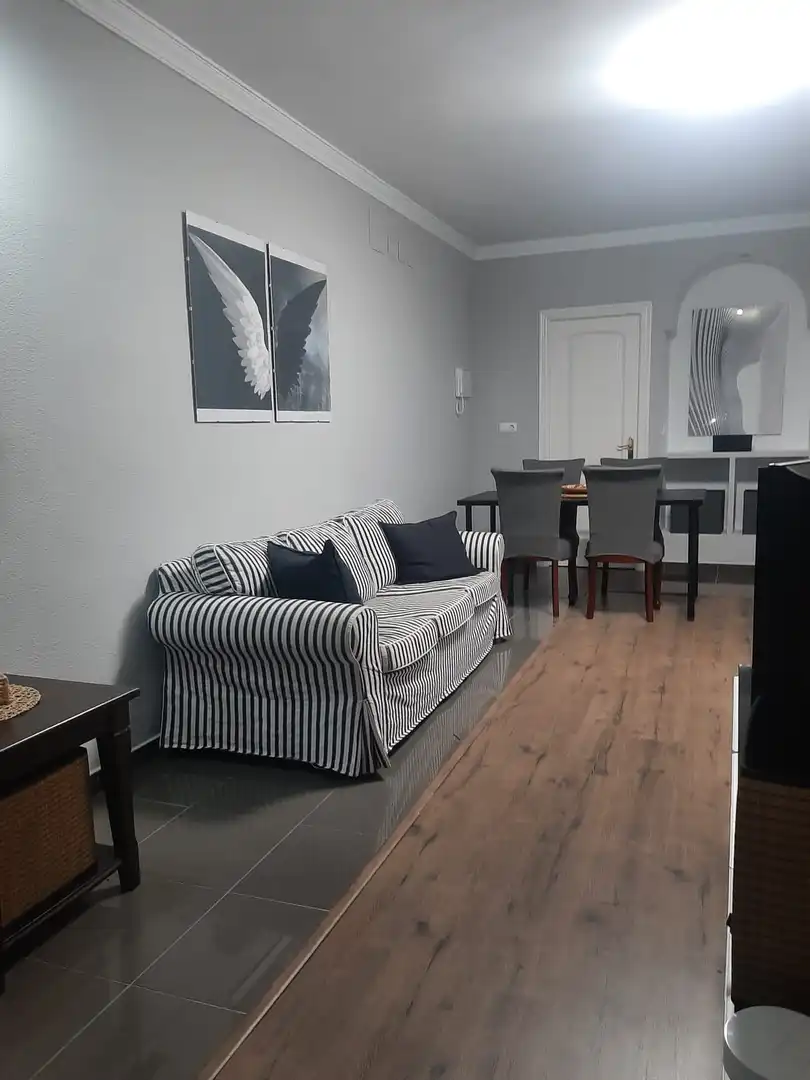 Living room of Flat for rent in Villaverde del Río  with Air Conditioner, Parquet flooring and Furnished