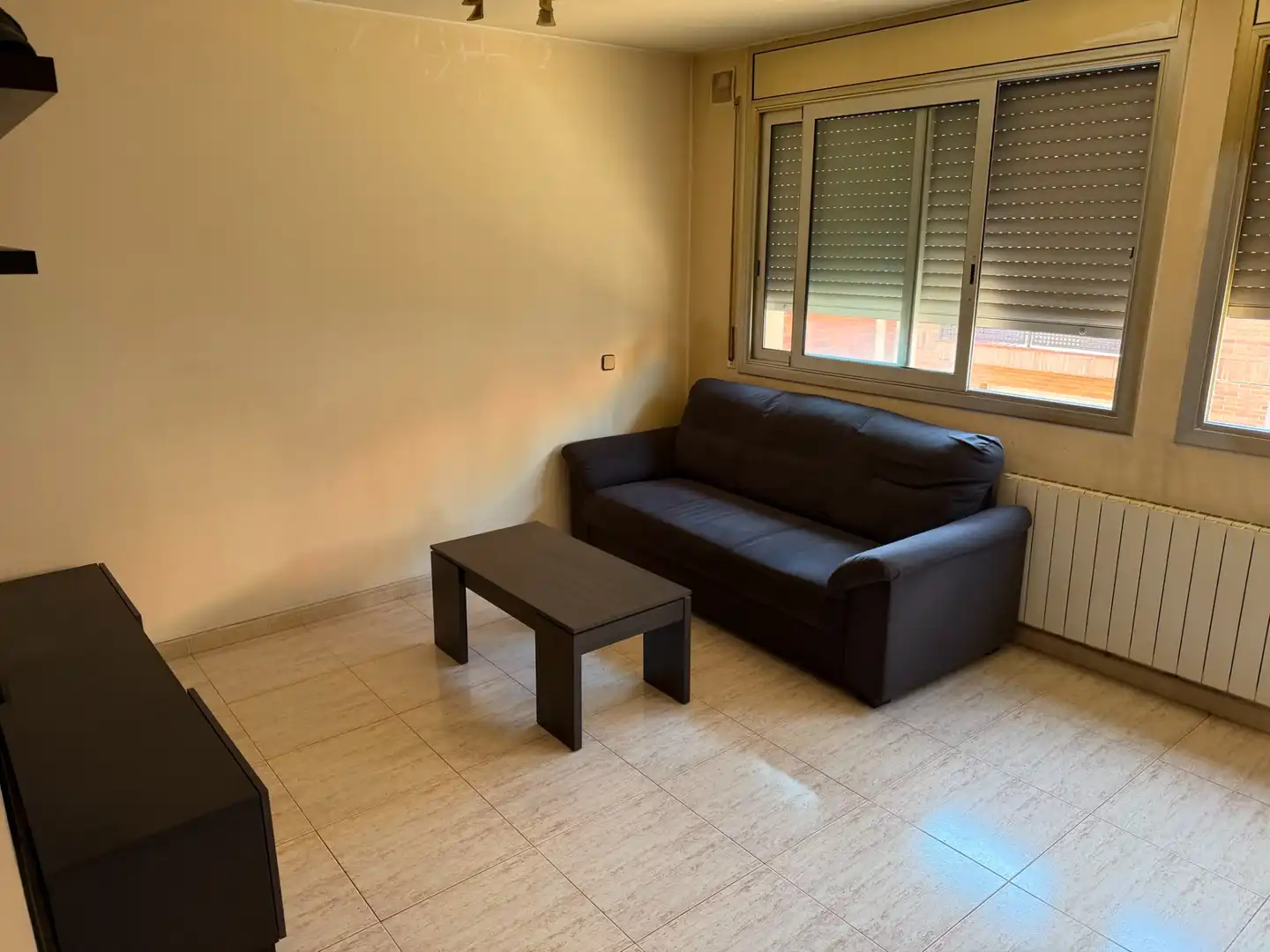 Wohnzimmer von Dachboden zum Verkauf in Badalona mit Heizung, Terrasse und Ofen