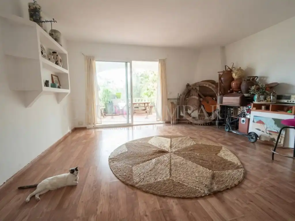 Sala d'estar de Planta baixa en venda en Sant Josep de sa Talaia amb Jardí privat i Terrassa