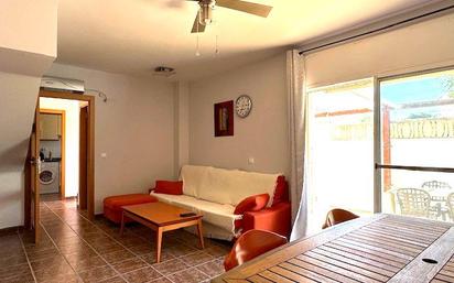 Sala d'estar de Casa adosada en venda en Mont-roig del Camp amb Terrassa i Piscina