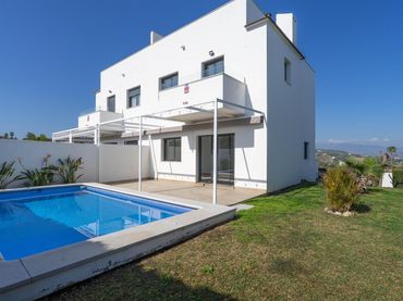 Casa aparellada amb piscina de lloguer a Centro