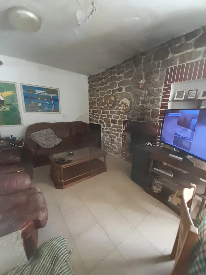 Sala d'estar de Casa o xalet en venda en Mont-roig del Camp amb Jardí privat i Moblat