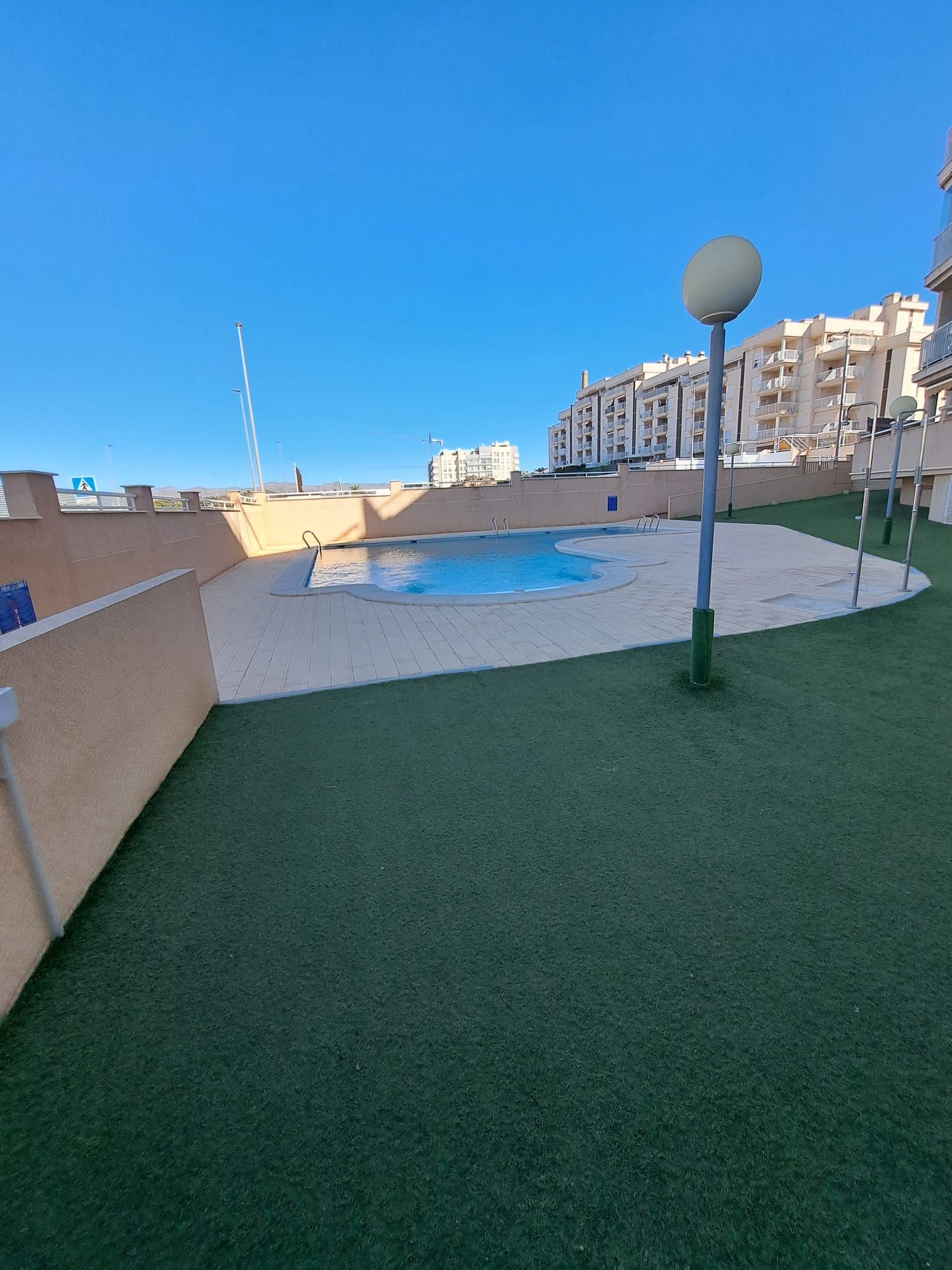 Piscina de Pis de lloguer en Águilas amb Aire condicionat, Calefacció i Jardí privat