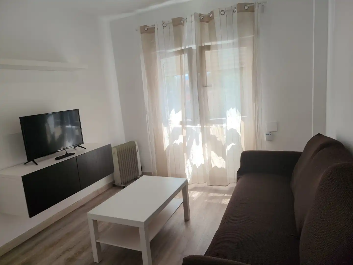 Sala d'estar de Pis de lloguer en Gijón  amb Calefacció