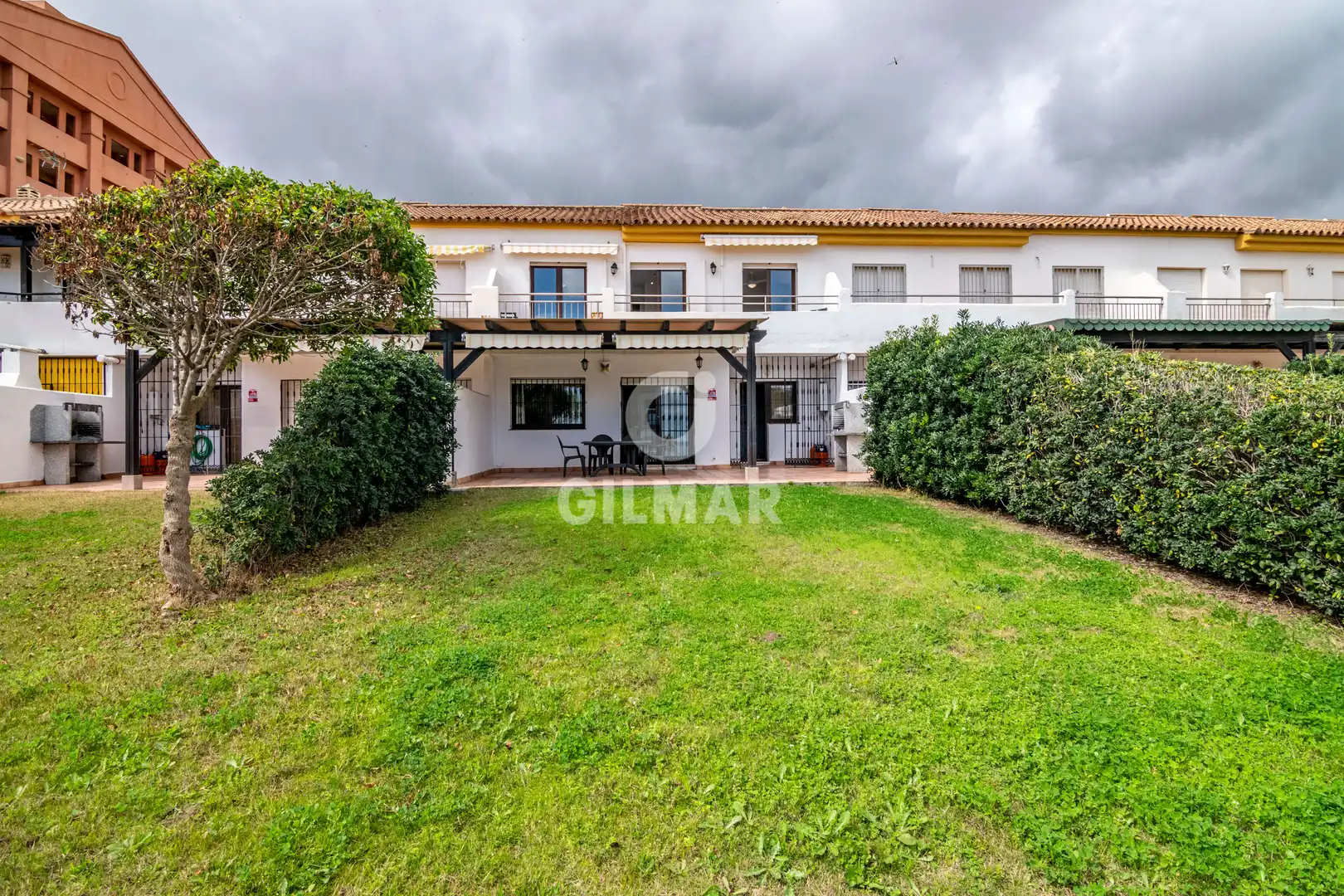 Garten von Einfamilien-Reihenhaus zum Verkauf in Manilva mit Heizung, Privatgarten und Schwimmbad