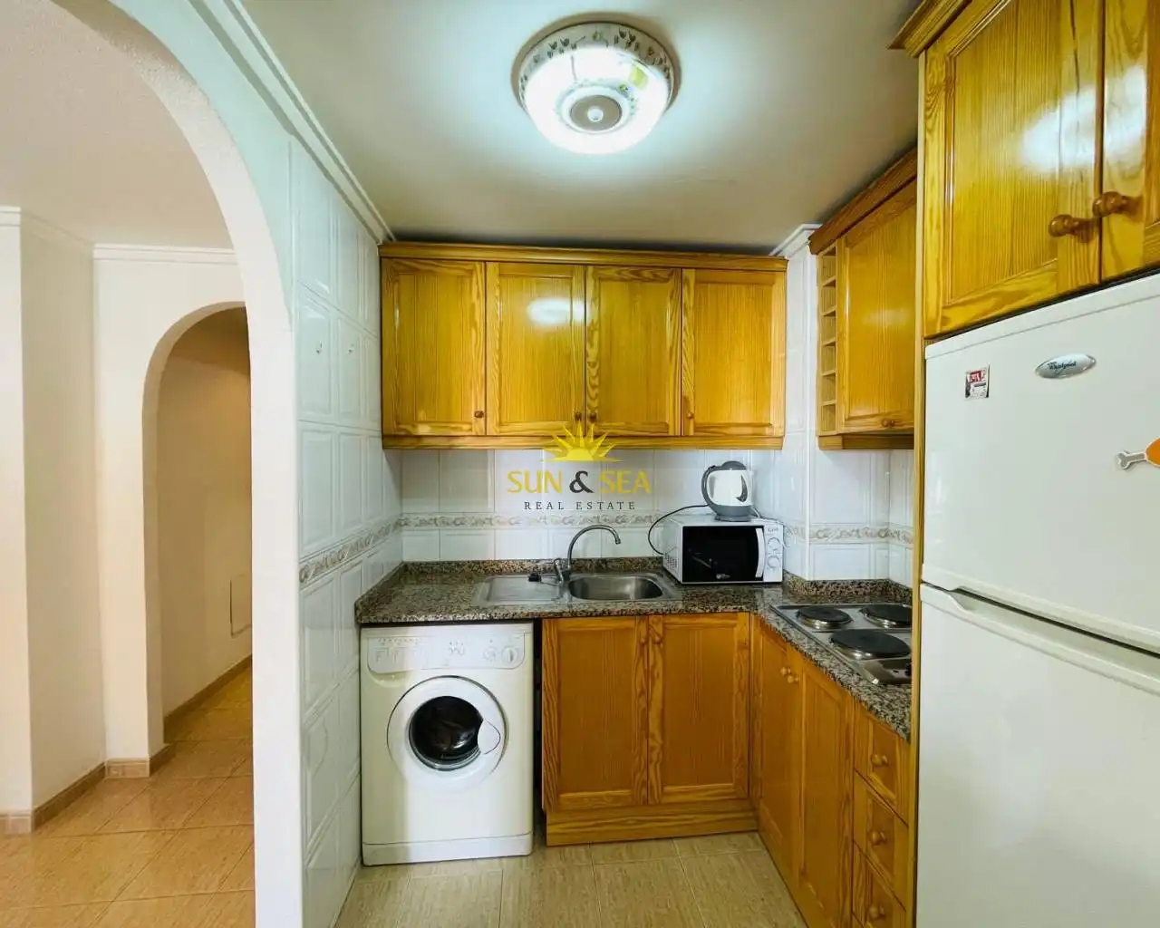 Cocina de Apartamento de alquiler en Torrevieja con Aire acondicionado, Calefacción y Piscina